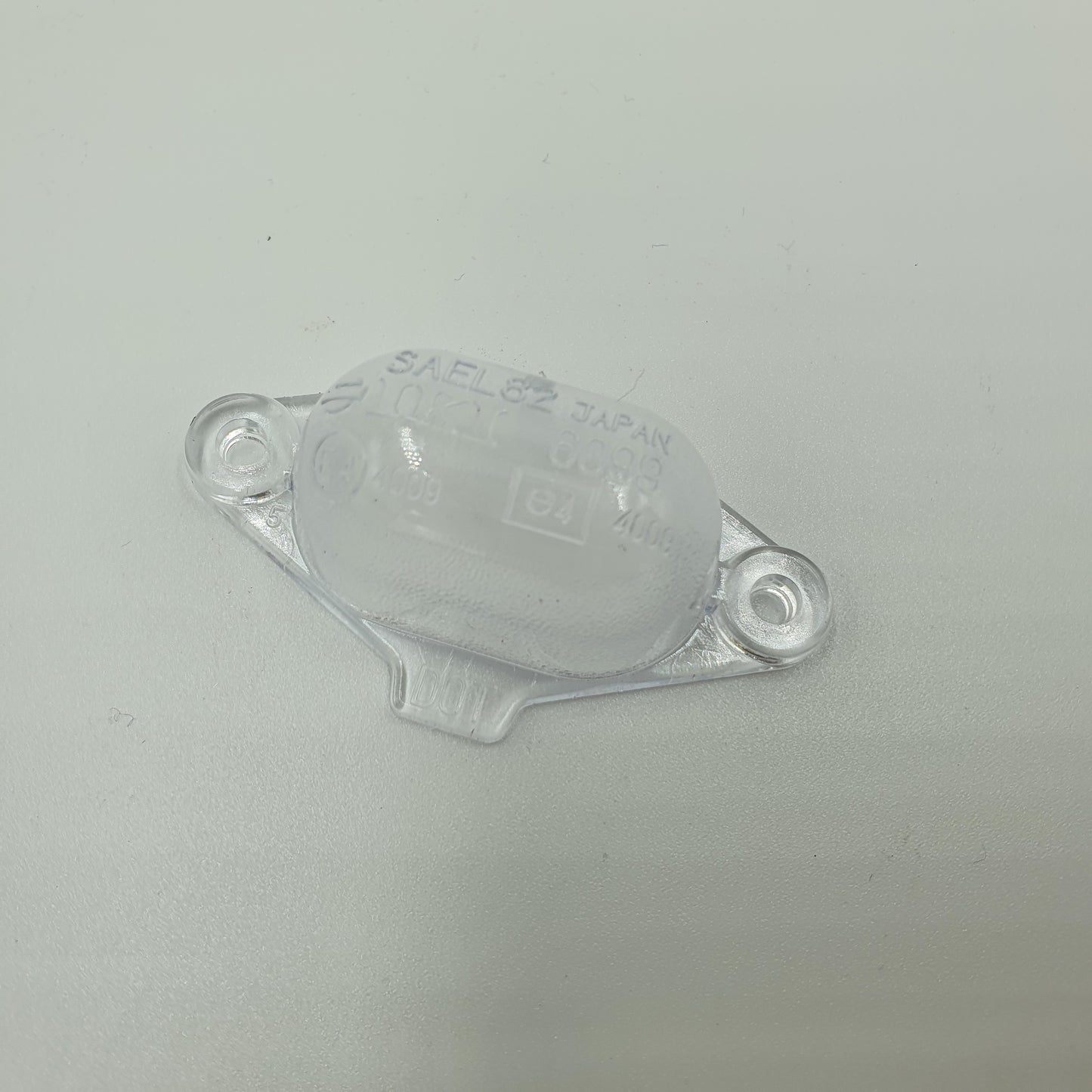 Nissan 300ZX Z32 - OEM License Plate Bulb Lens